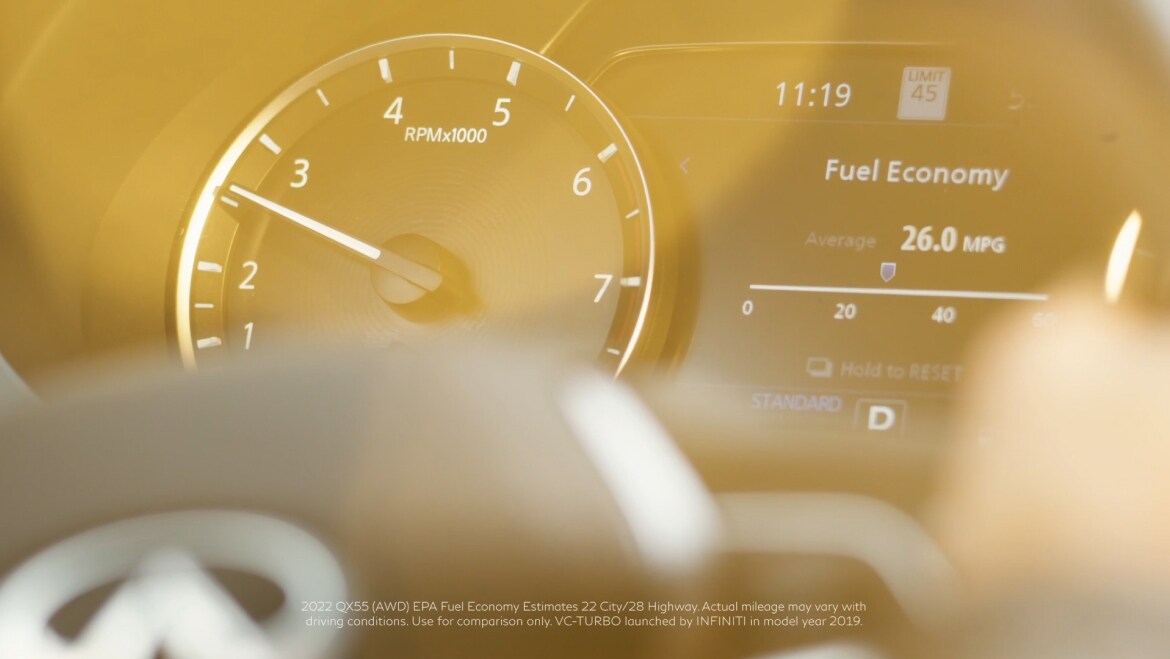 INFINITI cluster gauge showing fuel economy screen