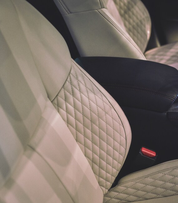 Close up of 2023 INFINITI Q50 front seats highlighting semi-aniline leather seats