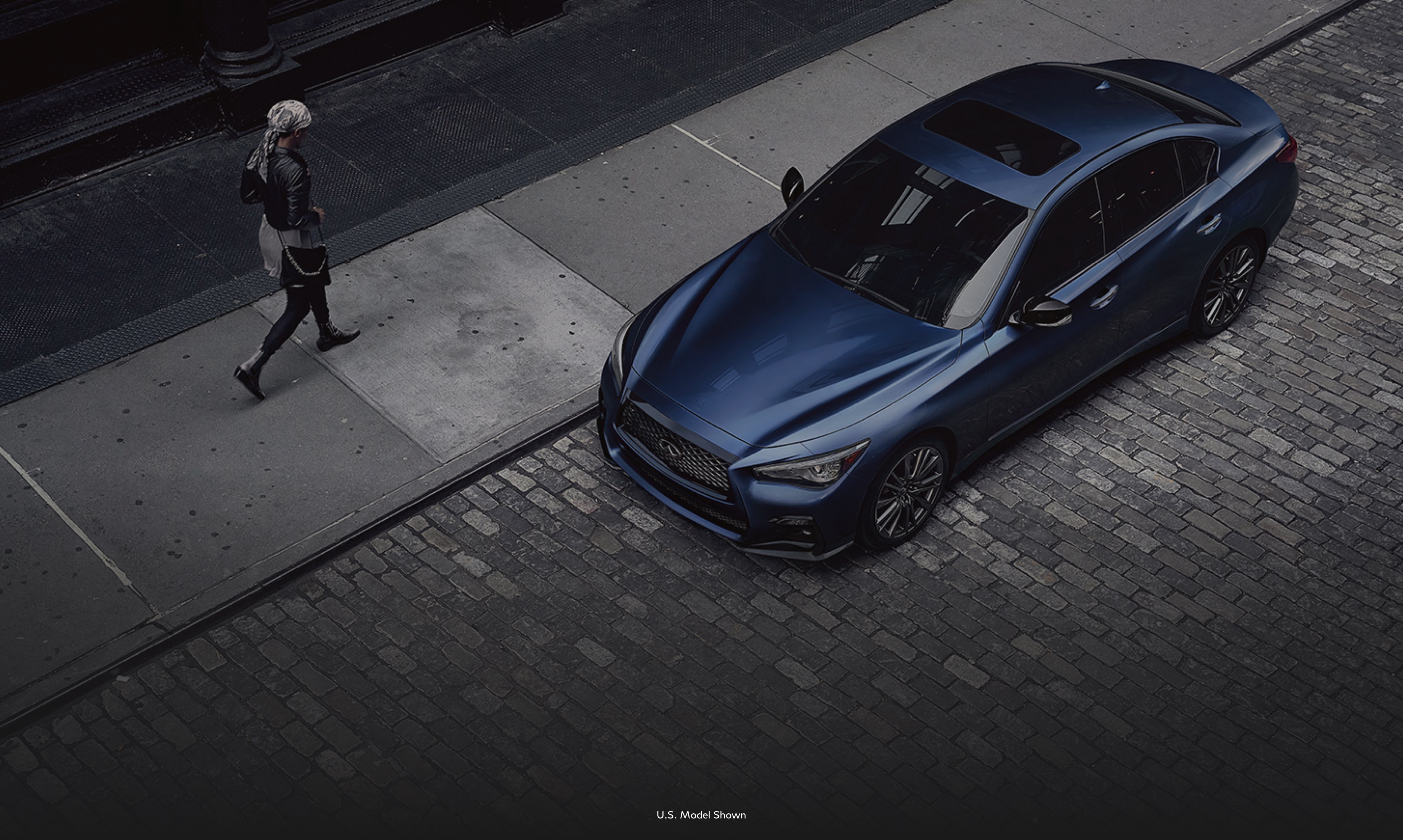 2022 INFINITI Q50 Luxury Sedan parked on street. U.S. model shown, Model may not be exactly as shown