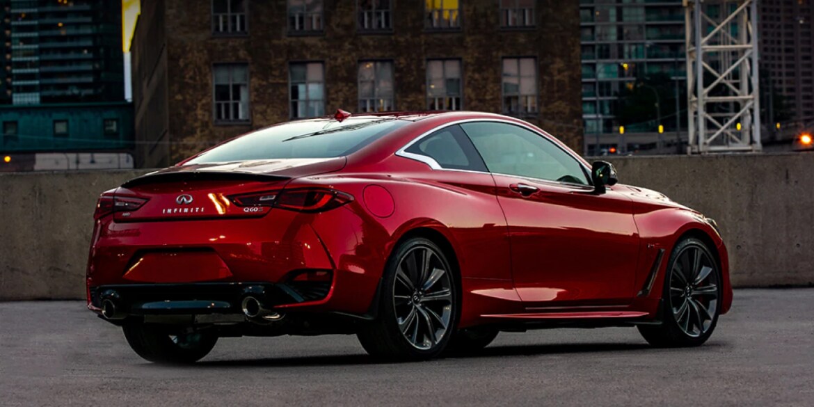 Rear and side view of a parked 2022 INFINITI Q60 Red Sport I-Line