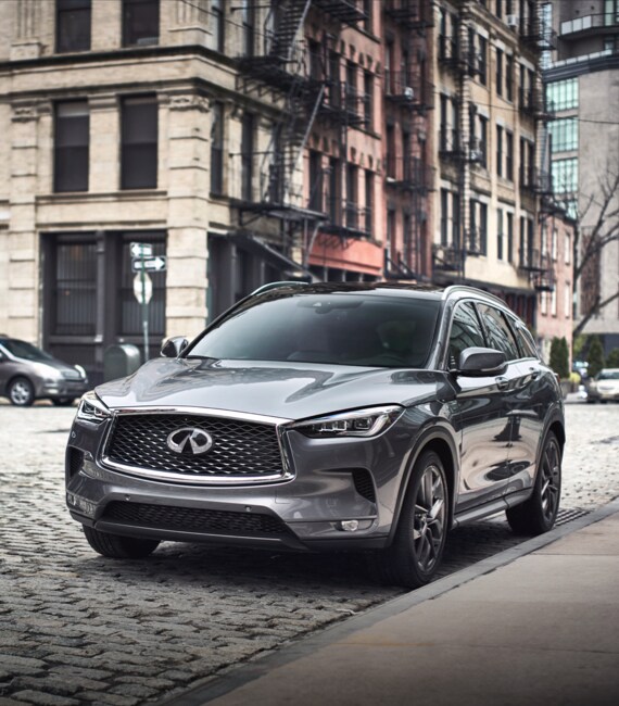 Graphite Shadow 2022 INFINITI QX50 parked on the side of the road