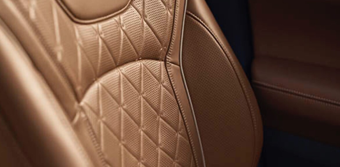 Close up view of 2022 INFINITI QX60 interior highlighting leather seats