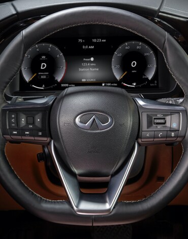Interior close up view of 2022 INFINITI QX60 steering wheel