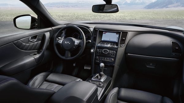 A veiw of a black leather interior and front dashboard inside an INFINITI QX70