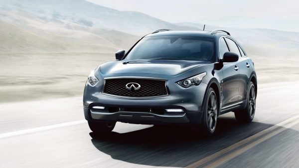 A QX70 drives on the highway with Intelligent Cruise Control active
