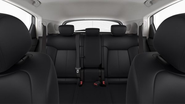 The rear seats featuring black leather interior and INFINITI's Advanced Airbag System inside the QX70