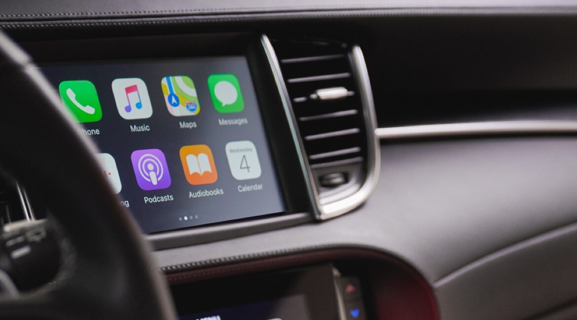 Interior of 2023 INFINITI QX55 highlighting Apple CarPlay feature