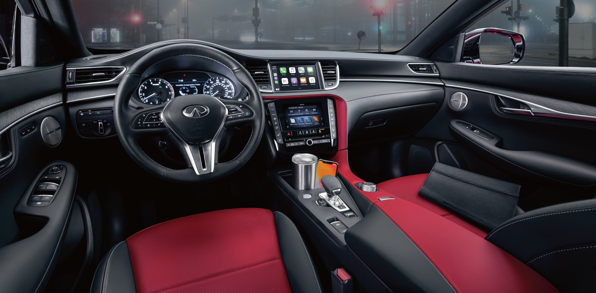 2023 INFINITI QX55 interior highlighting front seats and driver console