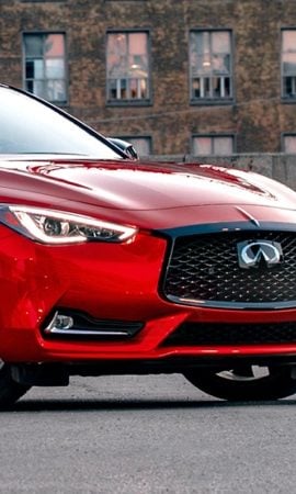 Mobile 428 x 926 wallpaper image of a red Q60 Sport Coupe front grill and headlights.