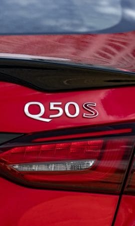 Mobile 428 x 926 wallpaper image of a red Q50 Sport Sedan's rear left tail light.