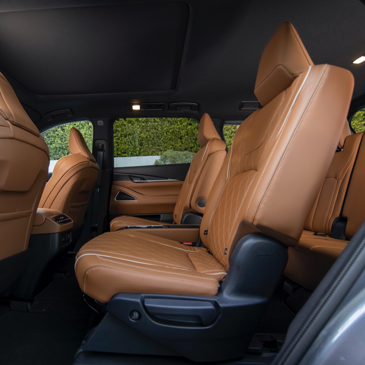 The rear leather seats inside the INFINITI QX60