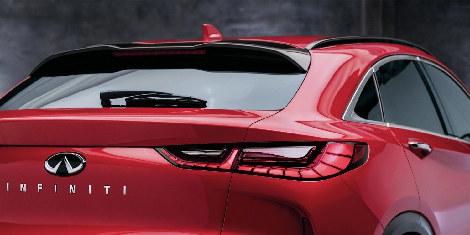 A view of the beautifully designed rear hatch on a red INFINITI crossover